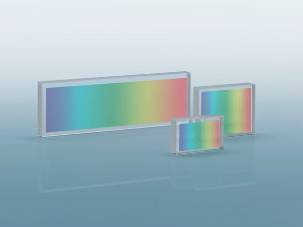 Pulse Compression Transmission Gratings