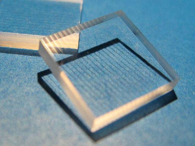 UV beam shaping with CaF2 micro lens array