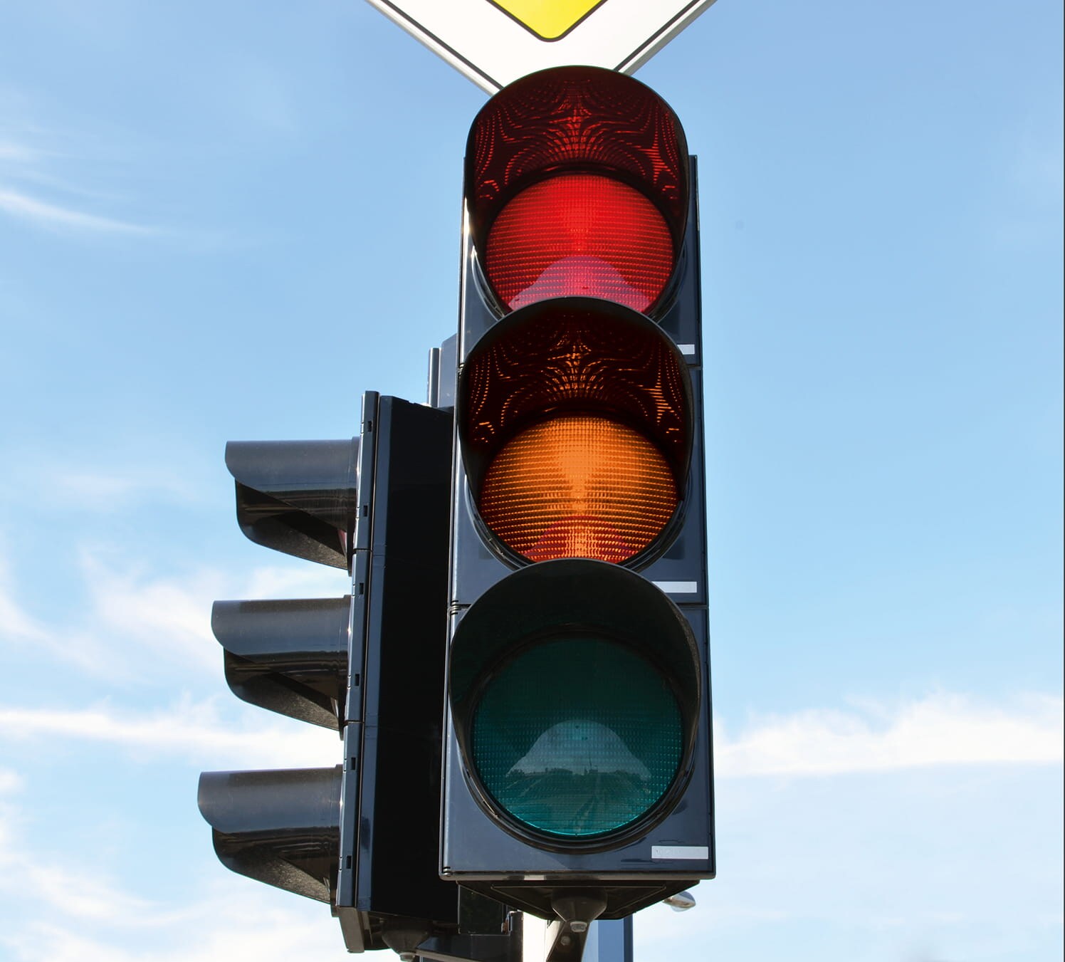 Combined red light and speed monitoring