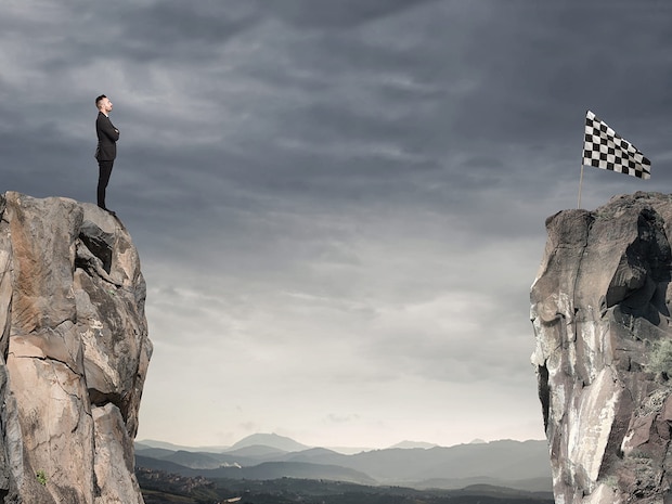 Identify the obstacles to find a better way forward. Businessman